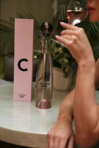 A bottle of Premium Celosa Rose Tequila and its packaging box.